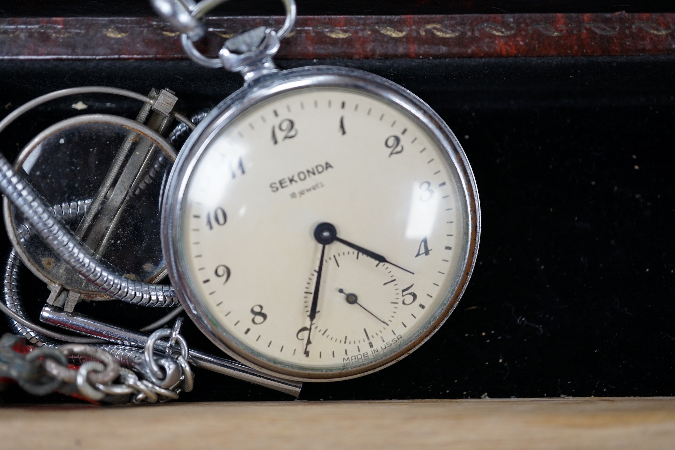 Eight assorted base metal pocket watches including Longines and Acme Lever.